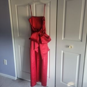 Beautiful red satin gown with bow in back, size 8